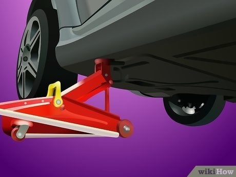 Выполните 11-ый шаг, используя специальный механизм, чтобы поднять транспортное средство и разместить его на подставки.